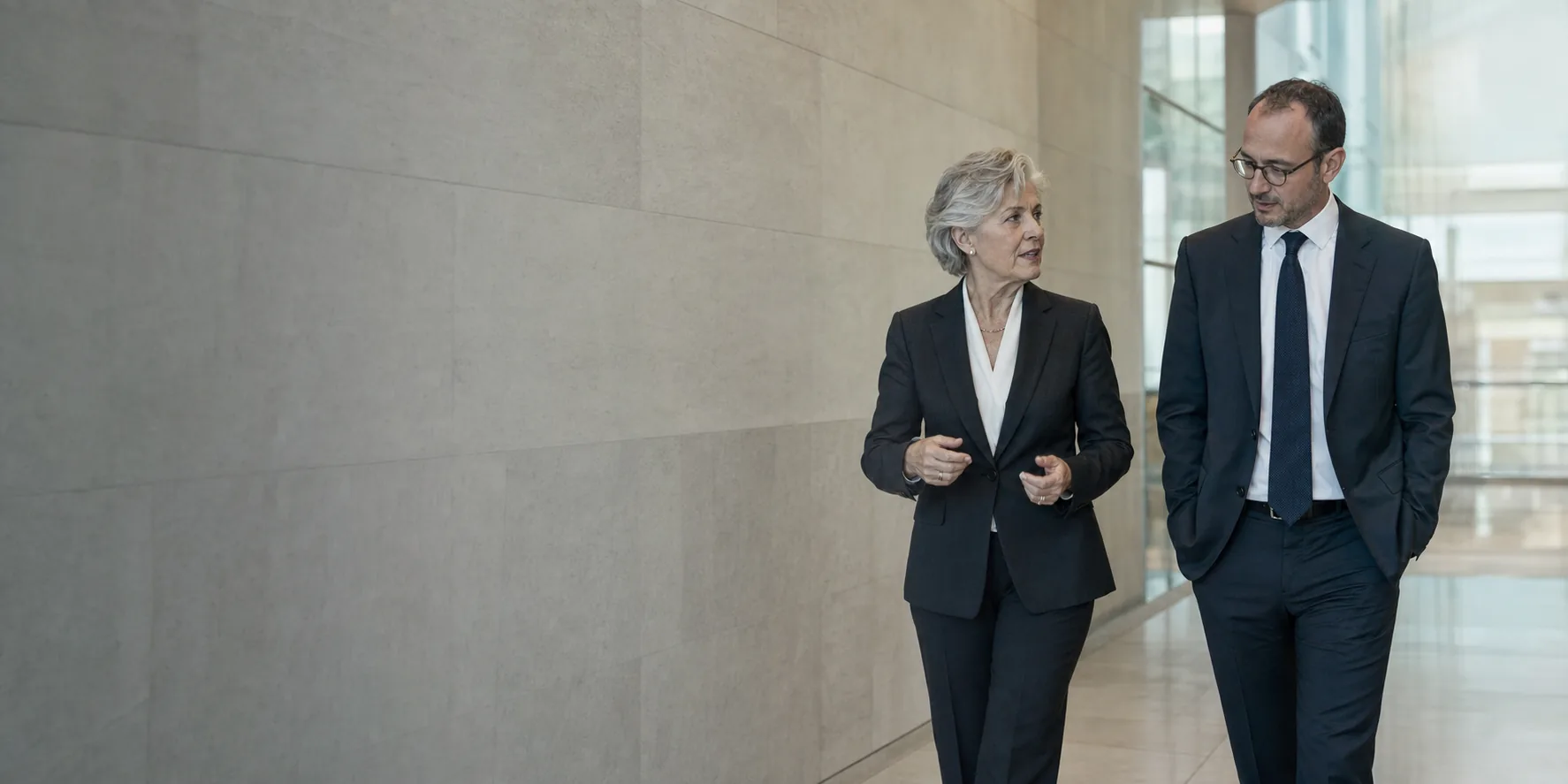 Senior executive and search advisor in a private office conversation